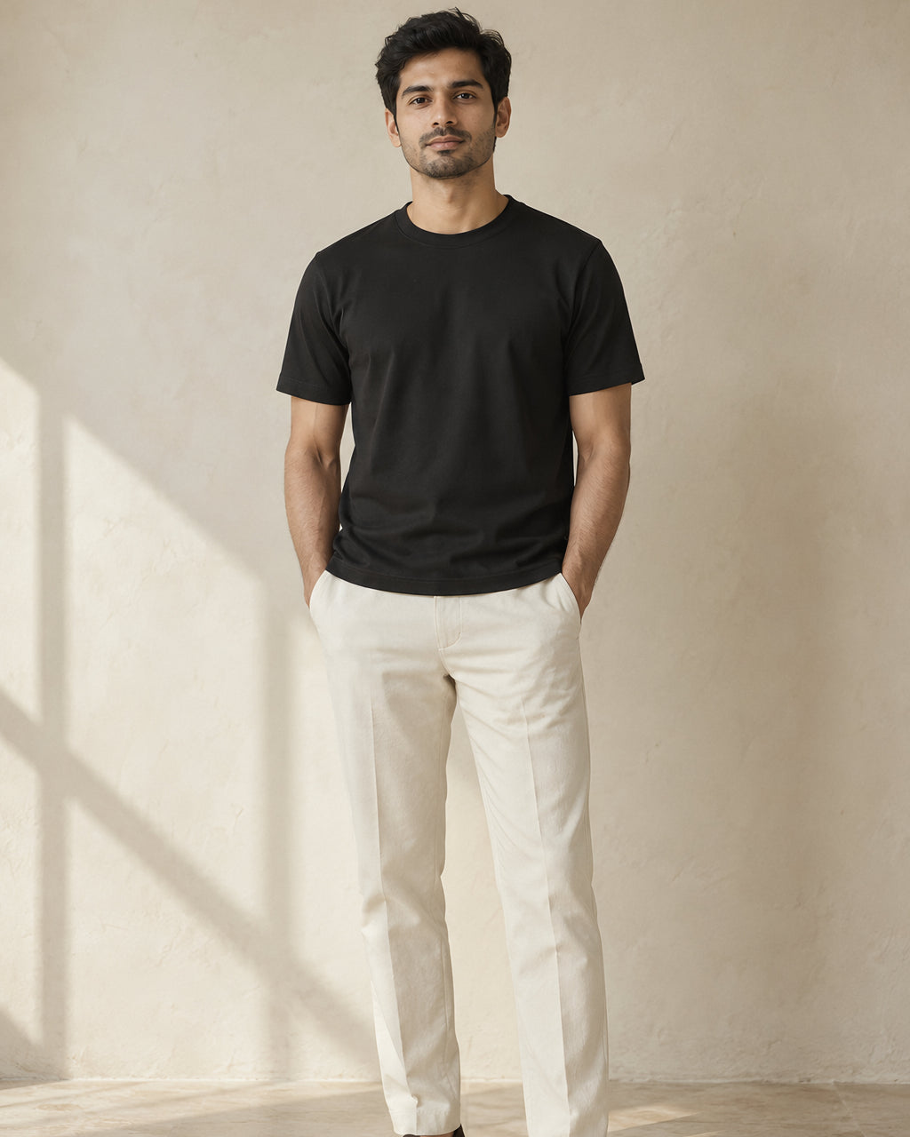 the signature tee in black, worn, front view