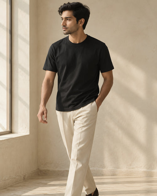 the signature tee in black, walking by the window