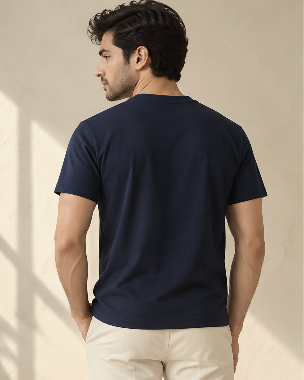 the signature tee in dark blue, back view