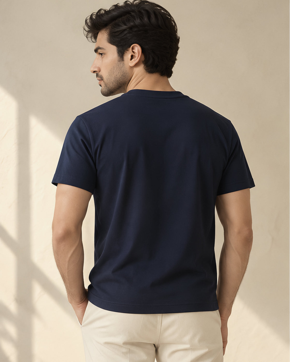 the signature tee in dark blue, back view